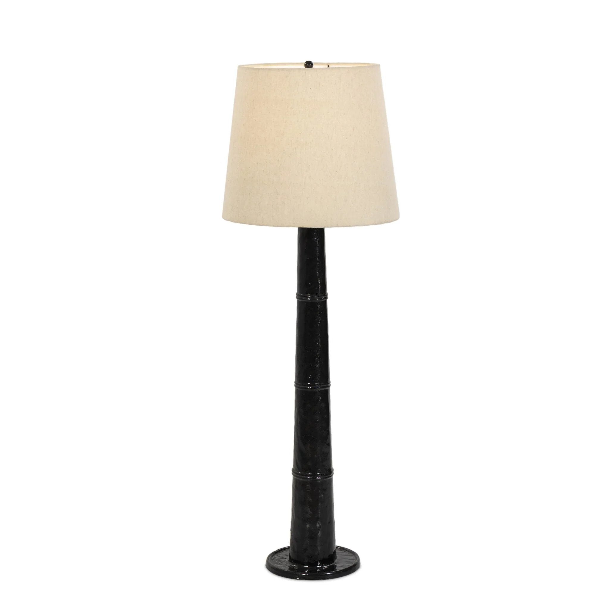 Inspired by a vintage salt shaker found while exploring Copenhagen, Denmark, this glossy cast aluminum lamp has a telescoping shape that's finished with a traditional flax linen shade Amethyst Home provides interior design, new home construction design consulting, vintage area rugs, and lighting in the Park City metro area.