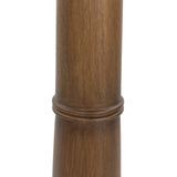 Inspired by a vintage salt shaker found while exploring Copenhagen, Denmark, this warm brown oak floor lamp has a telescoping shape that's finished with a traditional tan linen shade Amethyst Home provides interior design, new home construction design consulting, vintage area rugs, and lighting in the Park City metro area.