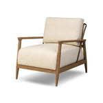 Angular wood and metal intersect across the waterfall paper cord back of this accent chair, with a tight seat and loose boxed back cushion adding comfort.As lovers of organic modern design at Amethyst, we love the warm modern inspired Nisha Chair - Antwerp Natural. Amethyst Home provides interior design, new home construction design consulting, vintage area rugs, and lighting in the Tampa metro area.