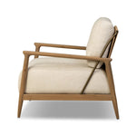 Angular wood and metal intersect across the waterfall paper cord back of this accent chair, with a tight seat and loose boxed back cushion adding comfort.As lovers of organic modern design at Amethyst, we love the warm modern inspired Nisha Chair - Antwerp Natural. Amethyst Home provides interior design, new home construction design consulting, vintage area rugs, and lighting in the Washington metro area.