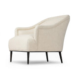 With elements of past eras at play, this updated Deco chair features a rounded back, sloped arms and a dramatic channel. The iron base and tapered legs support the cushiony seat — built with spring suspensions for long-lasting comfort. Amethyst Home provides interior design, new home construction design consulting, vintage area rugs, and lighting in the Austin metro area.