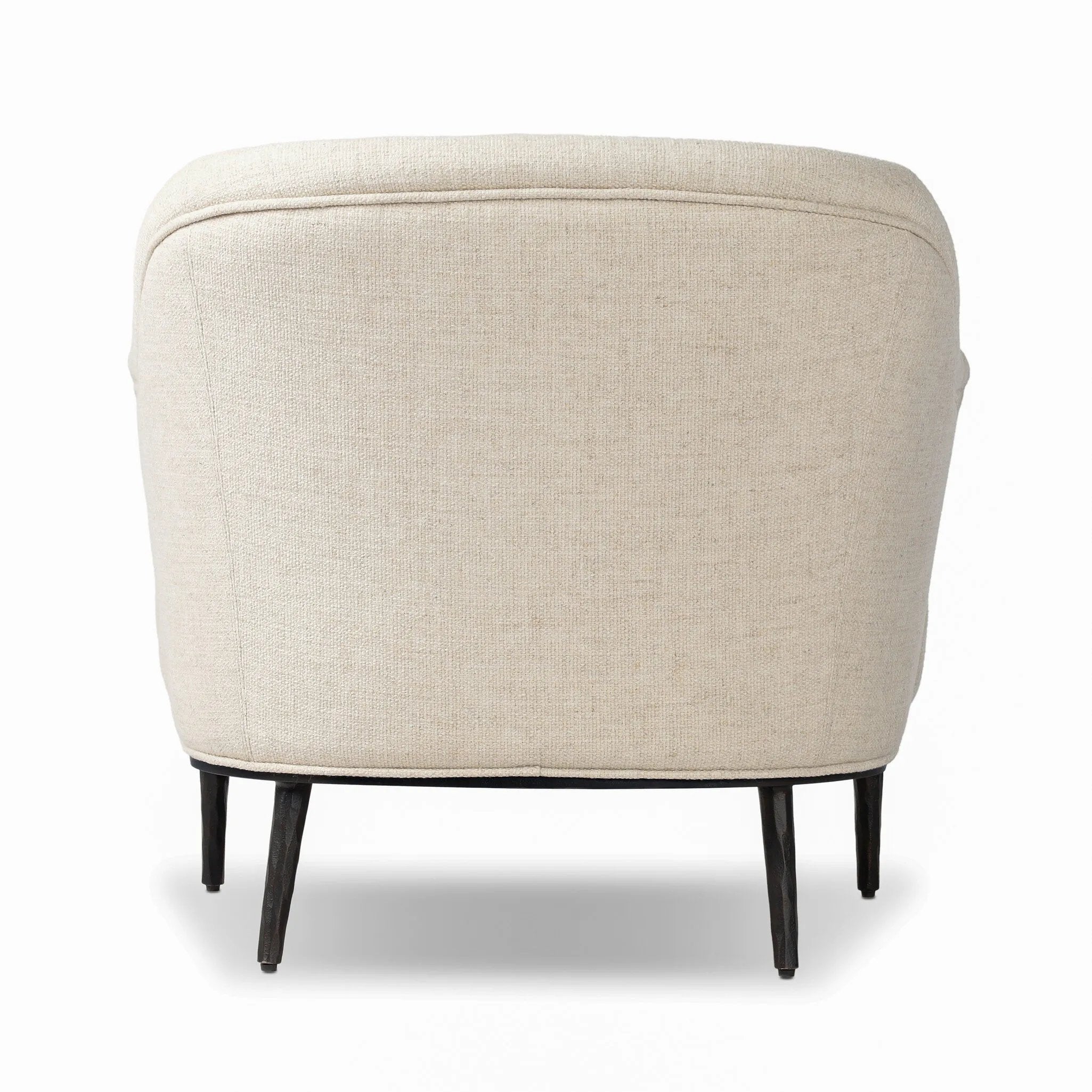 With elements of past eras at play, this updated Deco chair features a rounded back, sloped arms and a dramatic channel. The iron base and tapered legs support the cushiony seat — built with spring suspensions for long-lasting comfort. Amethyst Home provides interior design, new home construction design consulting, vintage area rugs, and lighting in the Houston metro area.