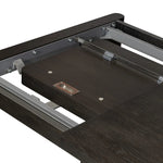Featuring Noeline Cracked Smoked Black Veneer Extension Dining Table by Four Hands at Amethyst Home. Made from smoked black oak with intentional cracking for an aged look, a self-storing extension creates space for extra guests. Equipped with four lockable wheels for easy extension to 116".Overall Dimensions: 96.00"w x 42.00"d x 30.00"hWeight : 275.58 lbsMate. Amethyst Home provides interior design, new home construction design consulting, vintage area rugs, and lighting in the Houston metro area.