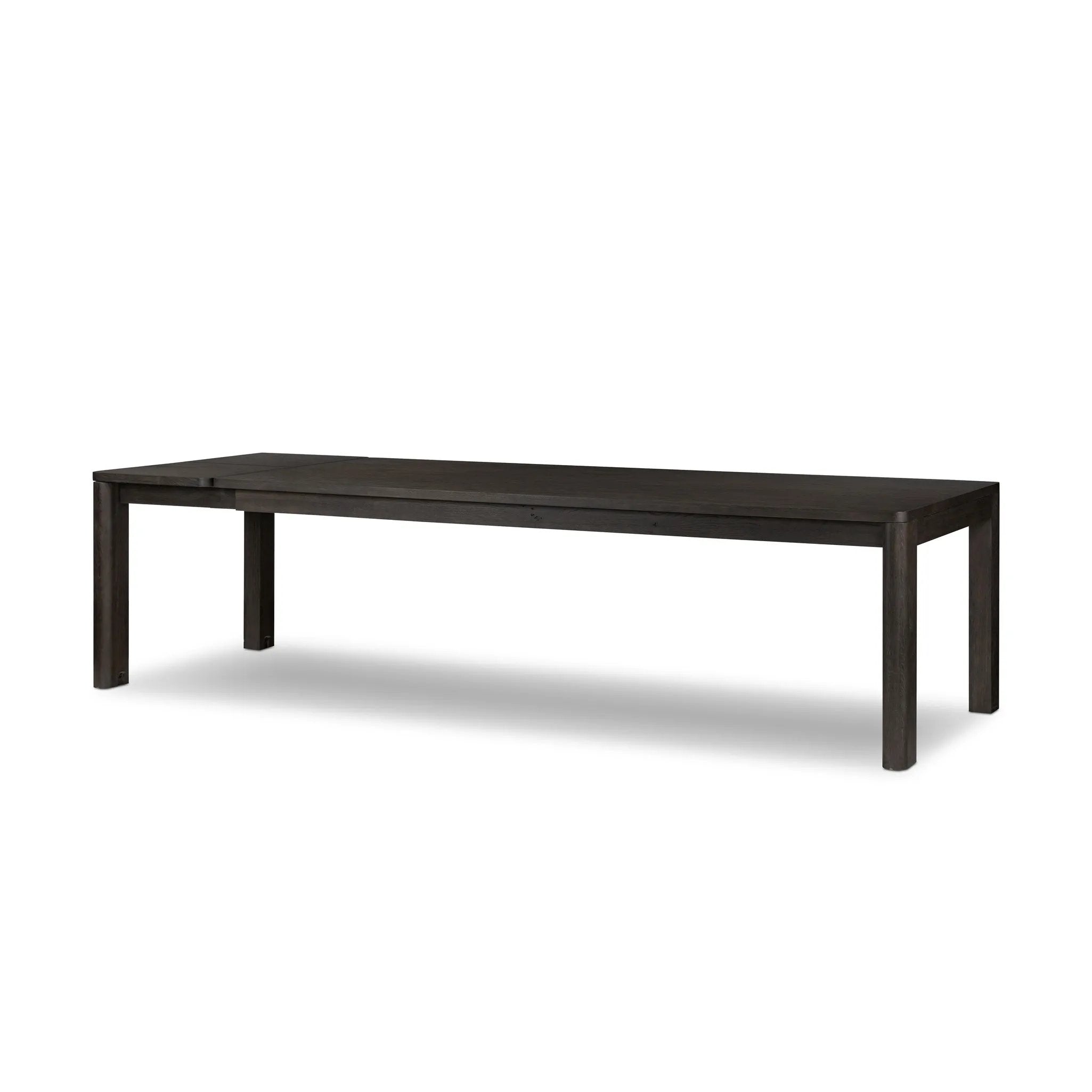 Featuring Noeline Cracked Smoked Black Veneer Extension Dining Table by Four Hands at Amethyst Home. Made from smoked black oak with intentional cracking for an aged look, a self-storing extension creates space for extra guests. Equipped with four lockable wheels for easy extension to 116".Overall Dimensions: 96.00"w x 42.00"d x 30.00"hWeight : 275.58 lbsMa. Amethyst Home provides interior design, new home construction design consulting, vintage area rugs, and lighting in the Nashville metro area.