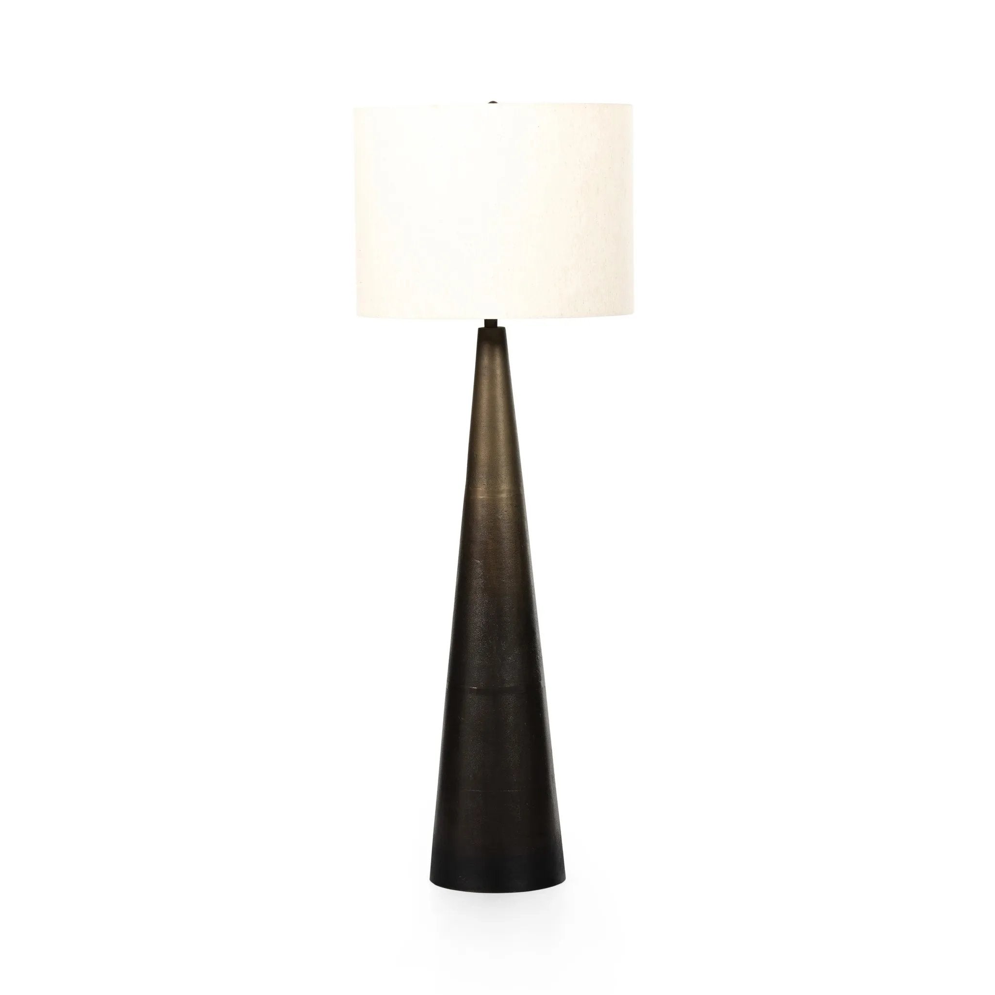 A striking silhouette. An antique brass finish highlights iron's gradual blending of hues for a distinctive ombre effect on this tapered metal base. Topped with a 100% cotton shade Amethyst Home provides interior design, new home construction design consulting, vintage area rugs, and lighting in the Los Angeles metro area.