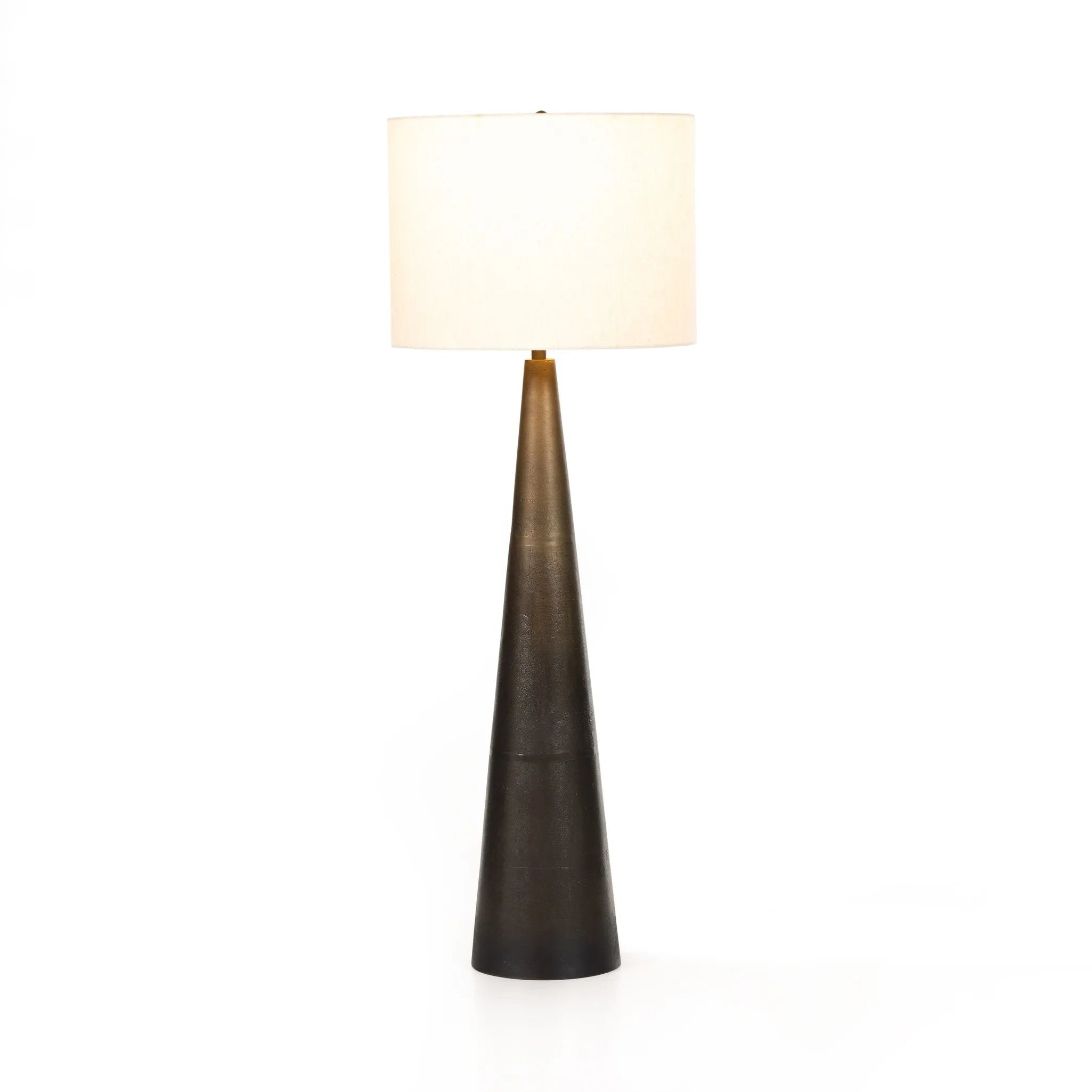 A striking silhouette. An antique brass finish highlights iron's gradual blending of hues for a distinctive ombre effect on this tapered metal base. Topped with a 100% cotton shade Amethyst Home provides interior design, new home construction design consulting, vintage area rugs, and lighting in the San Diego metro area.