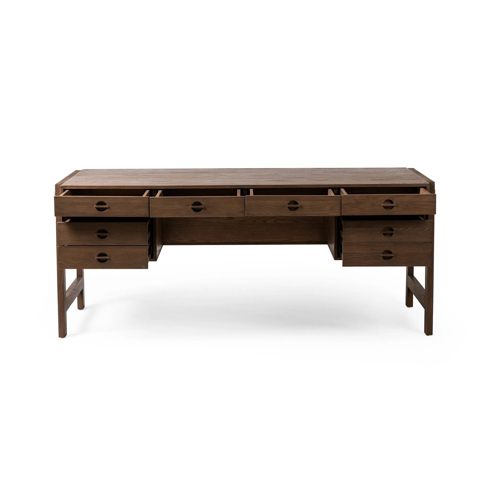Featuring Oakley Dark Toasted Oak Veneer Desk by Four Hands at Amethyst Home. Made from warm-toasted oak, brass-finished bolt covers add an aesthetic element to a storage-driven desk. Eight drawers plus open shelving offer plenty of space for office staples.Overall Dimensions: 72.00"w x 32.00"d x 30.00"hWeight : 186.29 lbsMaterials: Oak Veneer. Amethyst Home provides interior design, new home construction design consulting, vintage area rugs, and lighting in the Dallas metro area.