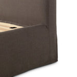 An arched headboard and simple frame act as the perfect canvas for your favorite bedding. A soft textural linen slipcover in a rich brown hue contributes a cozy yet refined look Amethyst Home provides interior design, new home construction design consulting, vintage area rugs, and lighting in the Austin metro area.