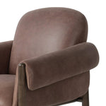 Experience luxury and comfort with the Olia Palermo Cigar Dining Chair. Designed for the ultimate dining experience, this chair features a sleek and elegant cigar-shaped design. Crafted with high-quality materials, it provides superior support and durability. Elevate your dining space with this exquisite piece Amethyst Home provides interior design, new home construction design consulting, vintage area rugs, and lighting in the Newport Beach metro area.