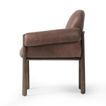 Experience luxury and comfort with the Olia Palermo Cigar Dining Chair. Designed for the ultimate dining experience, this chair features a sleek and elegant cigar-shaped design. Crafted with high-quality materials, it provides superior support and durability. Elevate your dining space with this exquisite piece Amethyst Home provides interior design, new home construction design consulting, vintage area rugs, and lighting in the Omaha metro area.