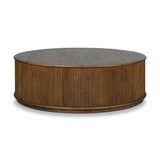 An artisanal take on texture. Made from amber-finished mindi with a plinth-style base, a reeding pattern is carved around the entirety of this coffee table table for a fresh, approachable look.As lovers of natural aesthetics at Amethyst, we love the warm modern inspired Ona Coffee Table - Amber Mindi Veneer. Amethyst Home provides interior design, new home construction design consulting, vintage area rugs, and lighting in the Scottsdale metro area.