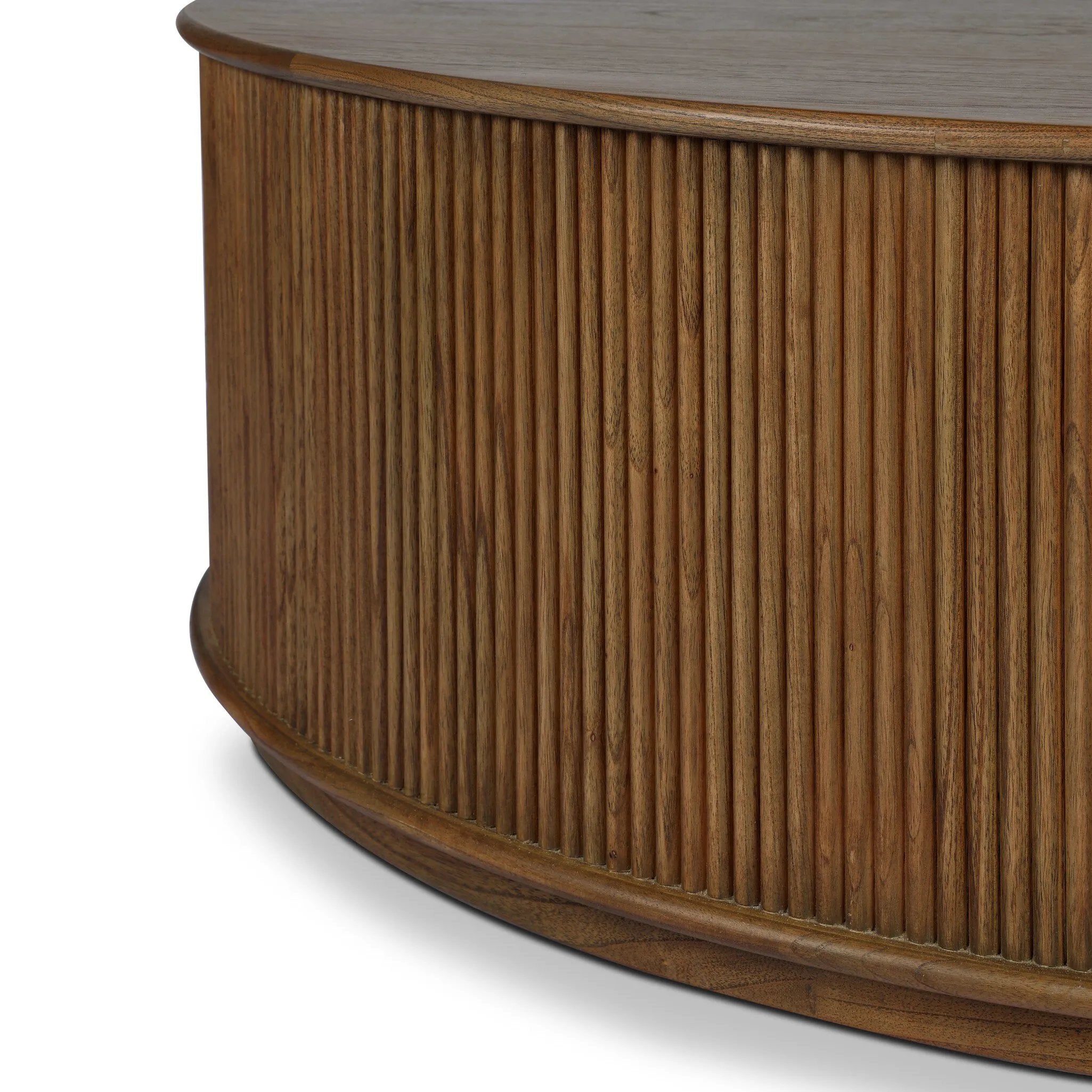 An artisanal take on texture. Made from amber-finished mindi with a plinth-style base, a reeding pattern is carved around the entirety of this coffee table table for a fresh, approachable look.As lovers of natural aesthetics at Amethyst, we love the warm modern inspired Ona Coffee Table - Amber Mindi Veneer. Amethyst Home provides interior design, new home construction design consulting, vintage area rugs, and lighting in the Winter Garden metro area.