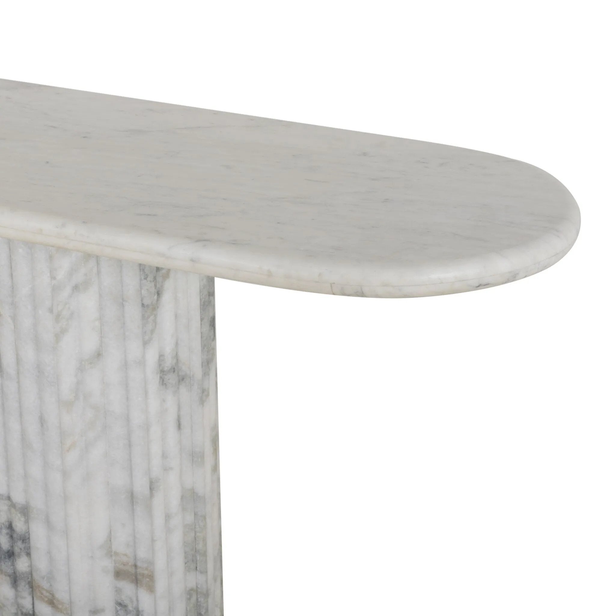 Italian-inspired for effortless sophistication. A swirling marble base is scalloped for a linear look with heavy texture, finished with a pill-shaped top for extra entryway styling atop this console table. Amethyst Home provides interior design, new home construction design consulting, vintage area rugs, and lighting in the San Diego metro area.