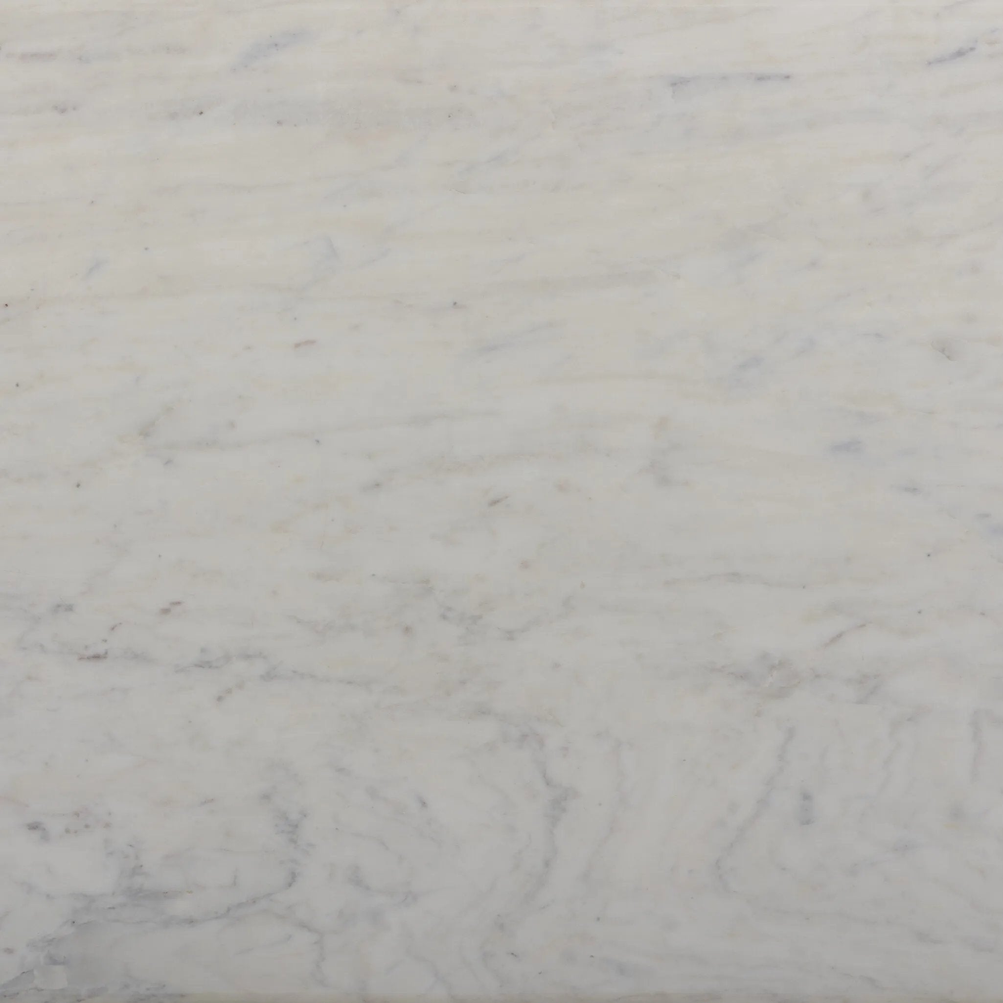 Italian-inspired for effortless sophistication. A swirling marble base is scalloped for a linear look with heavy texture, finished with a pill-shaped top for extra entryway styling atop this console table. Amethyst Home provides interior design, new home construction design consulting, vintage area rugs, and lighting in the Seattle metro area.