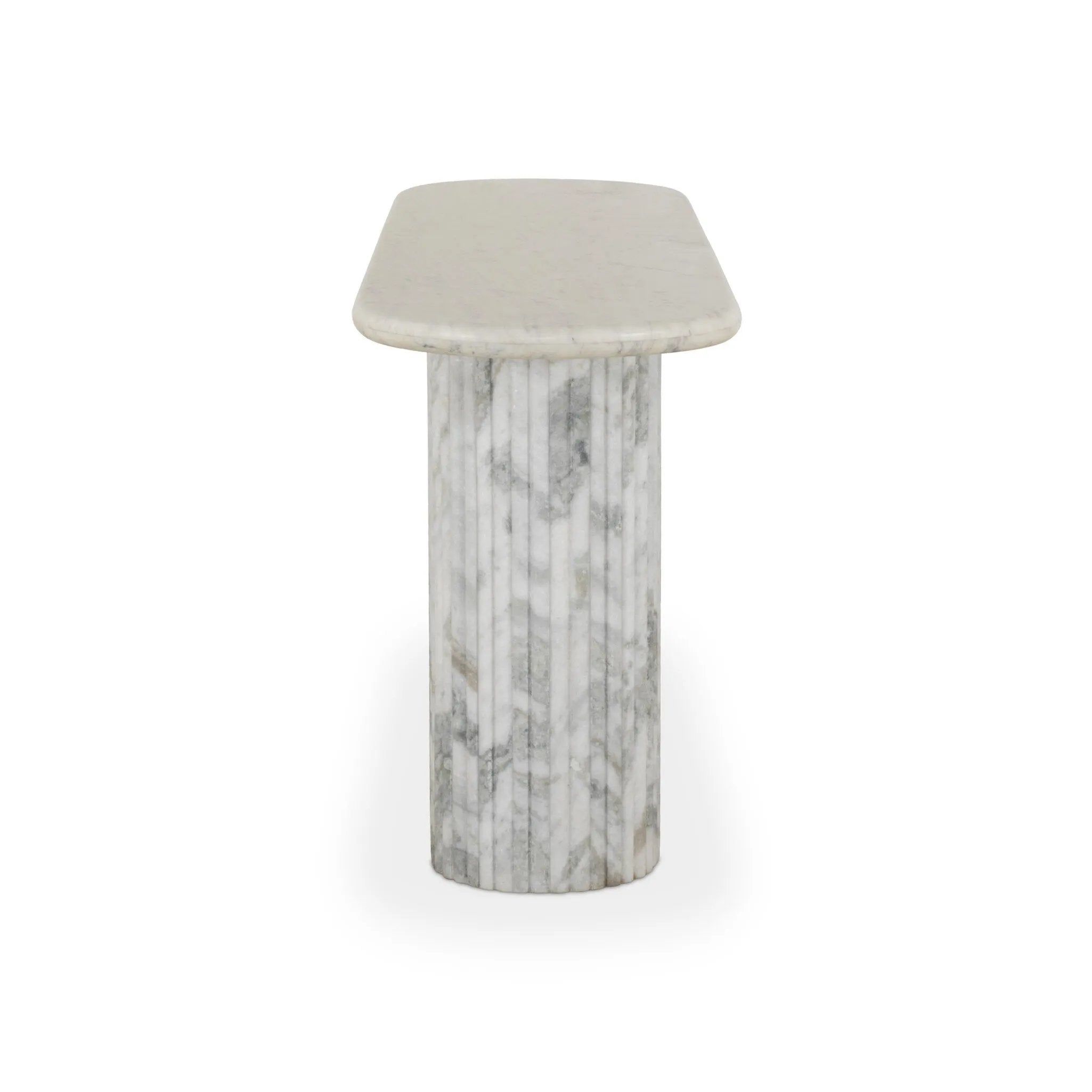 Italian-inspired for effortless sophistication. A swirling marble base is scalloped for a linear look with heavy texture, finished with a pill-shaped top for extra entryway styling atop this console table. Amethyst Home provides interior design, new home construction design consulting, vintage area rugs, and lighting in the Washington metro area.