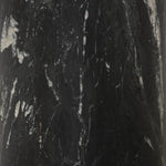 A material-driven piece inspired by post-modernism. A subtly organic round tabletop pairs with a swooped, sculptural pedestal base. Made from black marble for a striking, timeless look, with contrasting white veining playing up this piece's curves.As enthusiasts of luxe aesthetics at Amethyst, we love the designer inspired Oric Bistro Table. Amethyst Home provides interior design, new home construction design consulting, vintage area rugs, and lighting in the Austin metro area.