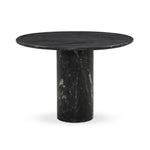 A material-driven piece inspired by post-modernism. A subtly organic round tabletop pairs with a swooped, sculptural pedestal base. Made from black marble for a striking, timeless look, with contrasting white veining playing up this piece's curves.As enthusiasts of luxe aesthetics at Amethyst, we love the designer inspired Oric Bistro Table. Amethyst Home provides interior design, new home construction design consulting, vintage area rugs, and lighting in the Park City metro area.