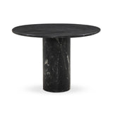 A material-driven piece inspired by post-modernism. A subtly organic round tabletop pairs with a swooped, sculptural pedestal base. Made from black marble for a striking, timeless look, with contrasting white veining playing up this piece's curves.As enthusiasts of luxe aesthetics at Amethyst, we love the designer inspired Oric Bistro Table. Amethyst Home provides interior design, new home construction design consulting, vintage area rugs, and lighting in the Park City metro area.