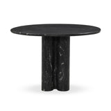 A material-driven piece inspired by post-modernism. A subtly organic round tabletop pairs with a swooped, sculptural pedestal base. Made from black marble for a striking, timeless look, with contrasting white veining playing up this piece's curves.As enthusiasts of luxe aesthetics at Amethyst, we love the designer inspired Oric Bistro Table. Amethyst Home provides interior design, new home construction design consulting, vintage area rugs, and lighting in the Portland metro area.