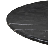 A material-driven piece inspired by post-modernism. A subtly organic round tabletop pairs with a swooped, sculptural pedestal base. Made from black marble for a striking, timeless look, with contrasting white veining playing up this piece's curves.As enthusiasts of luxe aesthetics at Amethyst, we love the designer inspired Oric Bistro Table. Amethyst Home provides interior design, new home construction design consulting, vintage area rugs, and lighting in the Winter Garden metro area.