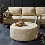 Natural stones form a neutral terrazzo pattern on a cream base, bringing a sense of texture and depth to this versatile coffee table. Designed with a clean, rounded silhouette, it works effortlessly in both indoor and outdoor spaces. Cover or store indoors during inclement weather and when not in use Amethyst Home provides interior design, new home construction design consulting, vintage area rugs, and lighting in the Miami metro area.