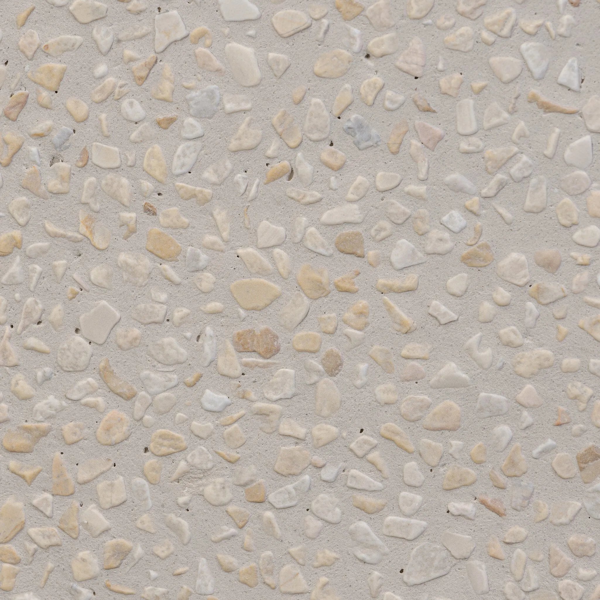 Natural stones form a neutral terrazzo pattern on a cream base, bringing a sense of texture and depth to this versatile coffee table. Designed with a clean, rounded silhouette, it works effortlessly in both indoor and outdoor spaces. Cover or store indoors during inclement weather and when not in use Amethyst Home provides interior design, new home construction design consulting, vintage area rugs, and lighting in the Portland metro area.
