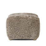 Featuring Oslo Taupe Shearling Ottoman by Four Hands at Amethyst Home. A subtle sweetheart shape paired with beige shearling plays into this ottoman's found object appeal. S-spring suspension offers a comfy place to sit and the shearling upholstery brings depth and vintage vibes throughout. Perfect styled alone or as part of a set for added drama. A desig. Amethyst Home provides interior design, new home construction design consulting, vintage area rugs, and lighting in the Los Angeles metro area.