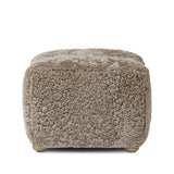 Featuring Oslo Taupe Shearling Ottoman by Four Hands at Amethyst Home. A subtle sweetheart shape paired with beige shearling plays into this ottoman's found object appeal. S-spring suspension offers a comfy place to sit and the shearling upholstery brings depth and vintage vibes throughout. Perfect styled alone or as part of a set for added drama. A desig. Amethyst Home provides interior design, new home construction design consulting, vintage area rugs, and lighting in the Los Angeles metro area.