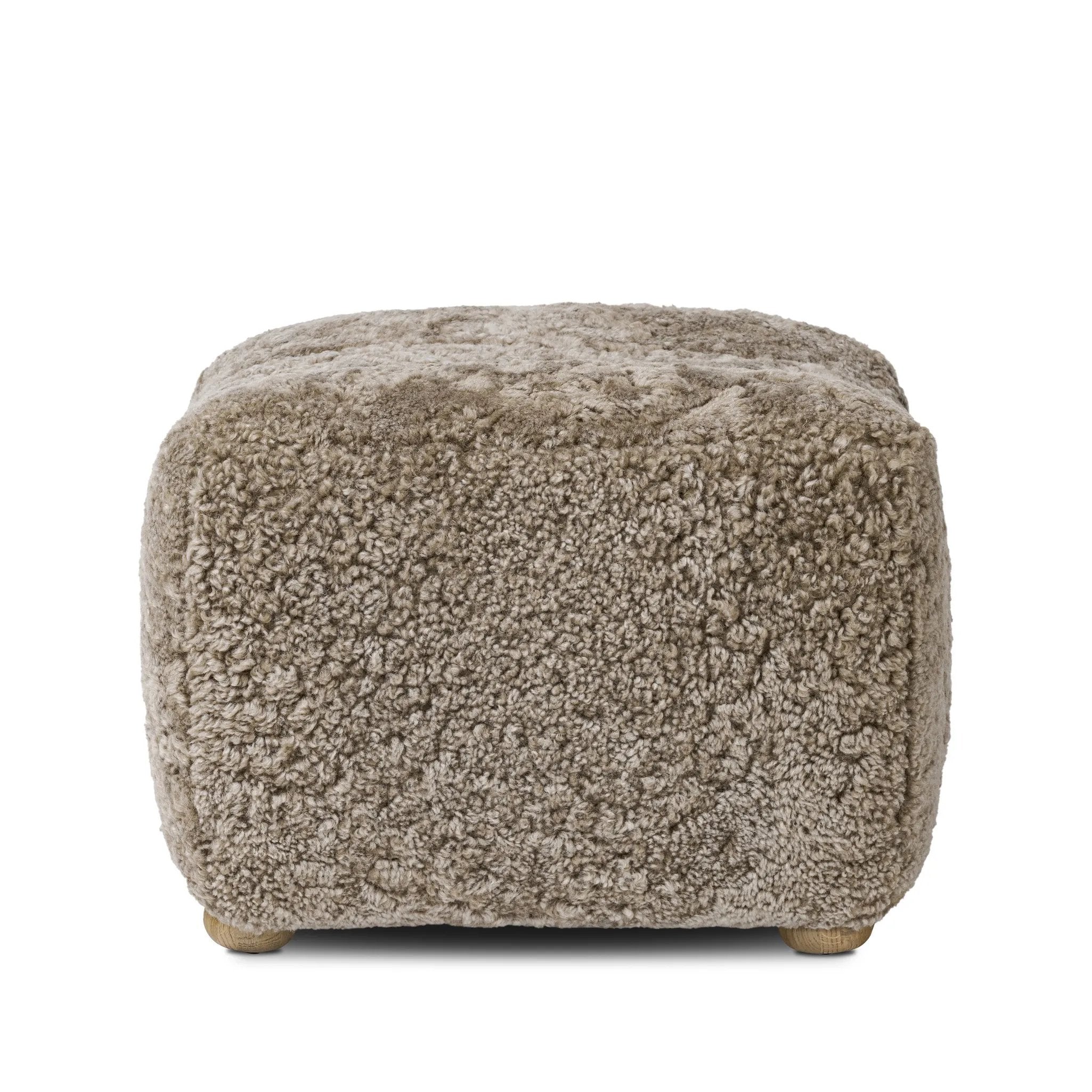 Featuring Oslo Taupe Shearling Ottoman by Four Hands at Amethyst Home. A subtle sweetheart shape paired with beige shearling plays into this ottoman's found object appeal. S-spring suspension offers a comfy place to sit and the shearling upholstery brings depth and vintage vibes throughout. Perfect styled alone or as part of a set for added drama. A desig. Amethyst Home provides interior design, new home construction design consulting, vintage area rugs, and lighting in the Los Angeles metro area.
