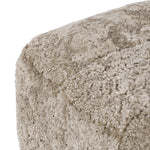 Featuring Oslo Taupe Shearling Ottoman by Four Hands at Amethyst Home. A subtle sweetheart shape paired with beige shearling plays into this ottoman's found object appeal. S-spring suspension offers a comfy place to sit and the shearling upholstery brings depth and vintage vibes throughout. Perfect styled alone or as part of a set for added drama. A design . Amethyst Home provides interior design, new home construction design consulting, vintage area rugs, and lighting in the San Diego metro area.