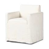 Featuring Ostend Bombay Flax  Outdoor Slipcover Dining Chair by Four Hands at Amethyst Home. This Ostend Bombay Flax Outdoor Slipcover Dining Chair is a durable and stylish option for your outdoor dining space. With its sleek design and flax-colored slipcover, this chair adds a touch of elegance to any setting. Made from high-quality materials, it offers both. Amethyst Home provides interior design, new home construction design consulting, vintage area rugs, and lighting in the Houston metro area.