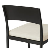 Streamlined and classic, this outdoor dining chair's simple silhouette features a subtly curved back on its matte black frame, finished with a cream linen-like seat cushion. Cover or store inside during inclement weather and when not in use. Amethyst Home provides interior design, new home construction design consulting, vintage area rugs, and lighting in the Boston metro area.
