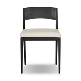 Streamlined and classic, this outdoor dining chair's simple silhouette features a subtly curved back on its matte black frame, finished with a cream linen-like seat cushion. Cover or store inside during inclement weather and when not in use. Amethyst Home provides interior design, new home construction design consulting, vintage area rugs, and lighting in the Kansas City metro area.
