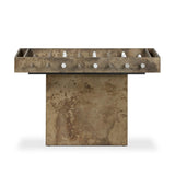 Inspired by Brutalist design, this outdoor foosball table is constructed of industrial oxidized aluminum panels, framing a travertine play surface atop a monolith plinth base that highlights the character of the finish. Two-toned players are cast in solid aluminum. Cover or store indoors during inclement weather and when not in use. Amethyst Home provides interior design, new home construction design consulting, vintage area rugs, and lighting in the Kansas City metro area.