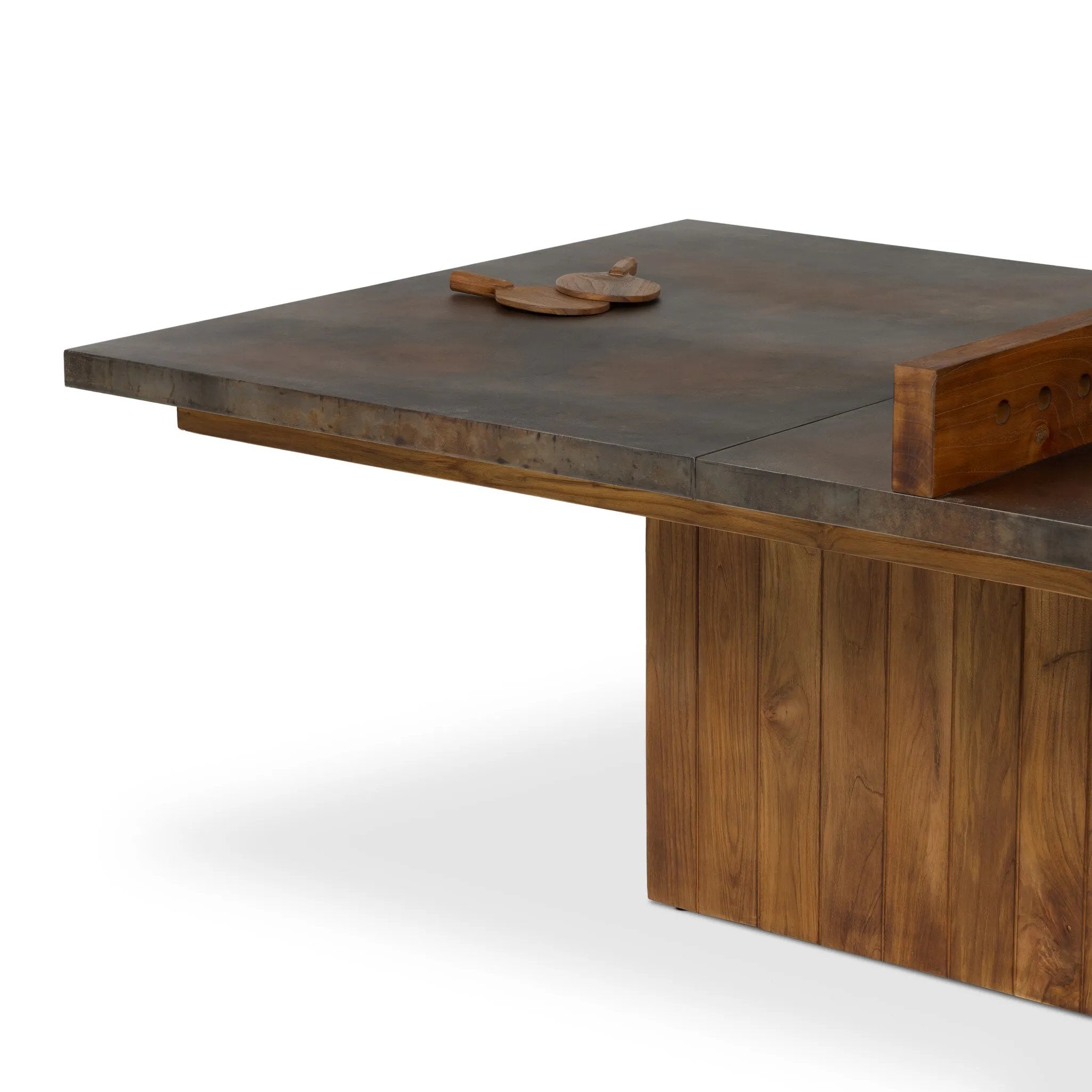 Outdoor-friendly and made for play, this ping pong table is clad in slatted teak and paired with a warm, tonal rust aluminum metal top with lots of visual movement. The teak net is removable, easily turning game time into dinner time. Includes four wooden paddles. Cover or store indoors during inclement weather and when not in use. Amethyst Home provides interior design, new home construction design consulting, vintage area rugs, and lighting in the Des Moines metro area.