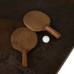 Outdoor-friendly and made for play, this ping pong table is clad in slatted teak and paired with a warm, tonal rust aluminum metal top with lots of visual movement. The teak net is removable, easily turning game time into dinner time. Includes four wooden paddles. Cover or store indoors during inclement weather and when not in use. Amethyst Home provides interior design, new home construction design consulting, vintage area rugs, and lighting in the Los Angeles metro area.