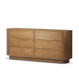 Seasoned brown acacia forms a pedestal base, bringing gentle curves to a classic dresser shape. Six drawers bring spacious storage to the bedroom Amethyst Home provides interior design, new home construction design consulting, vintage area rugs, and lighting in the Des Moines metro area.