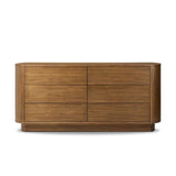 Seasoned brown acacia forms a pedestal base, bringing gentle curves to a classic dresser shape. Six drawers bring spacious storage to the bedroom Amethyst Home provides interior design, new home construction design consulting, vintage area rugs, and lighting in the Seattle metro area.