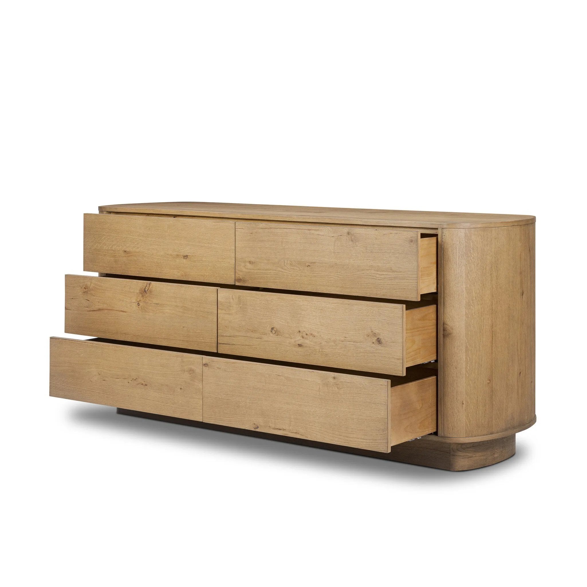 Light, worn oak forms a pedestal base, bringing gentle curves to a classic dresser shape. Six drawers bring spacious storage to the bedroom Amethyst Home provides interior design, new home construction design consulting, vintage area rugs, and lighting in the Houston metro area.