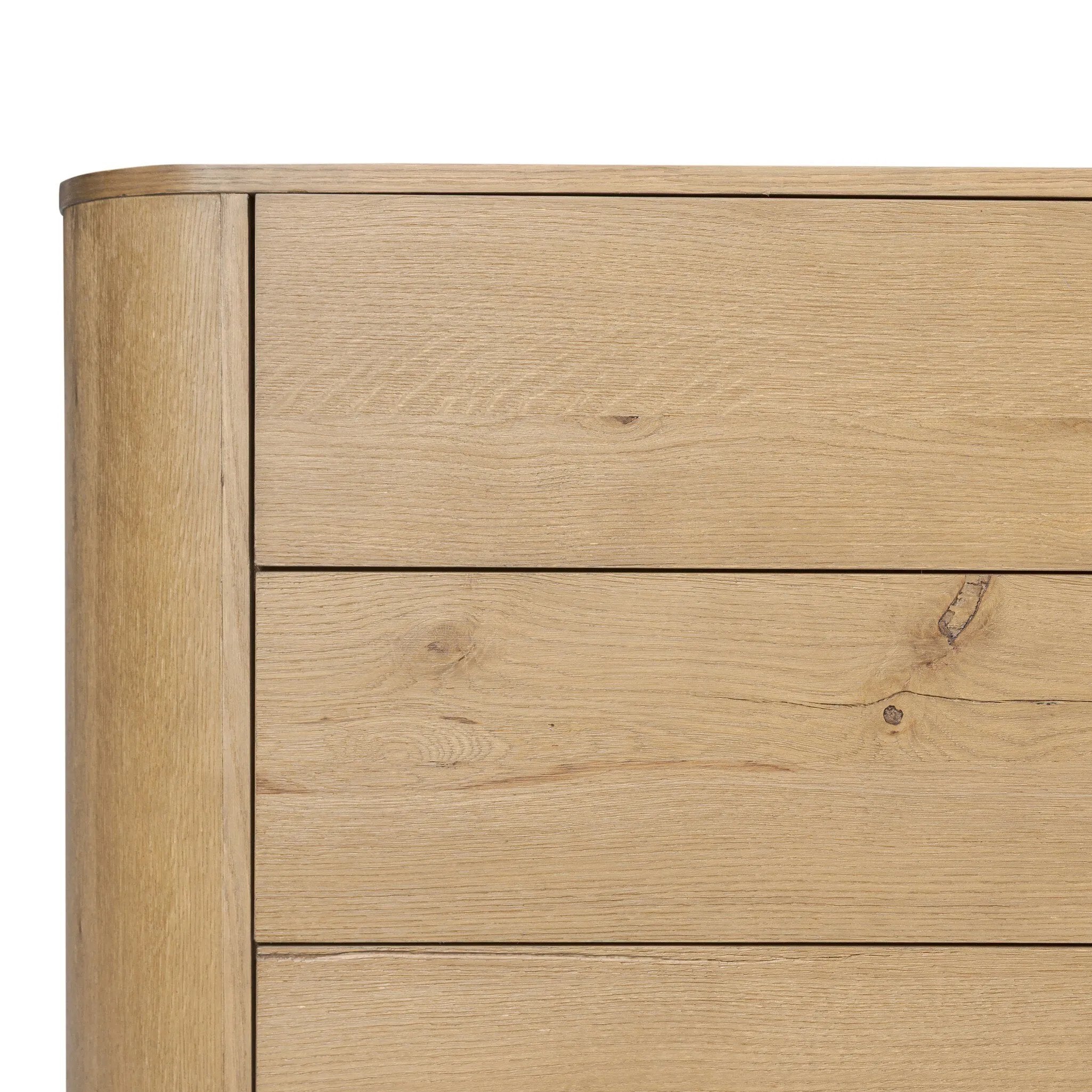 Light, worn oak forms a pedestal base, bringing gentle curves to a classic dresser shape. Six drawers bring spacious storage to the bedroom Amethyst Home provides interior design, new home construction design consulting, vintage area rugs, and lighting in the Winter Garden metro area.