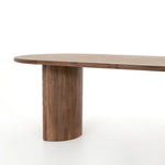 Featuring Paden Seasoned Brown Acacia Dining Table by Four Hands at Amethyst Home. A study in shape. Solid brown acacia forms crescent-shaped legs and sprawling oval tabletop, bringing organic presence to the dining room.Overall Dimensions: 94.00"w x 42.00"d x 30.00"hWeight : 139.33 lbsMaterials : Thin Acacia Veneer, Solid Acacia. Amethyst Home provides interior design, new home construction design consulting, vintage area rugs, and lighting in the Seattle metro area.