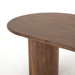 Featuring Paden Seasoned Brown Acacia Dining Table by Four Hands at Amethyst Home. A study in shape. Solid brown acacia forms crescent-shaped legs and sprawling oval tabletop, bringing organic presence to the dining room.Overall Dimensions: 94.00"w x 42.00"d x 30.00"hWeight : 139.33 lbsMaterials : Thin Acacia Veneer, Solid Acacia. Amethyst Home provides interior design, new home construction design consulting, vintage area rugs, and lighting in the Tampa metro area.