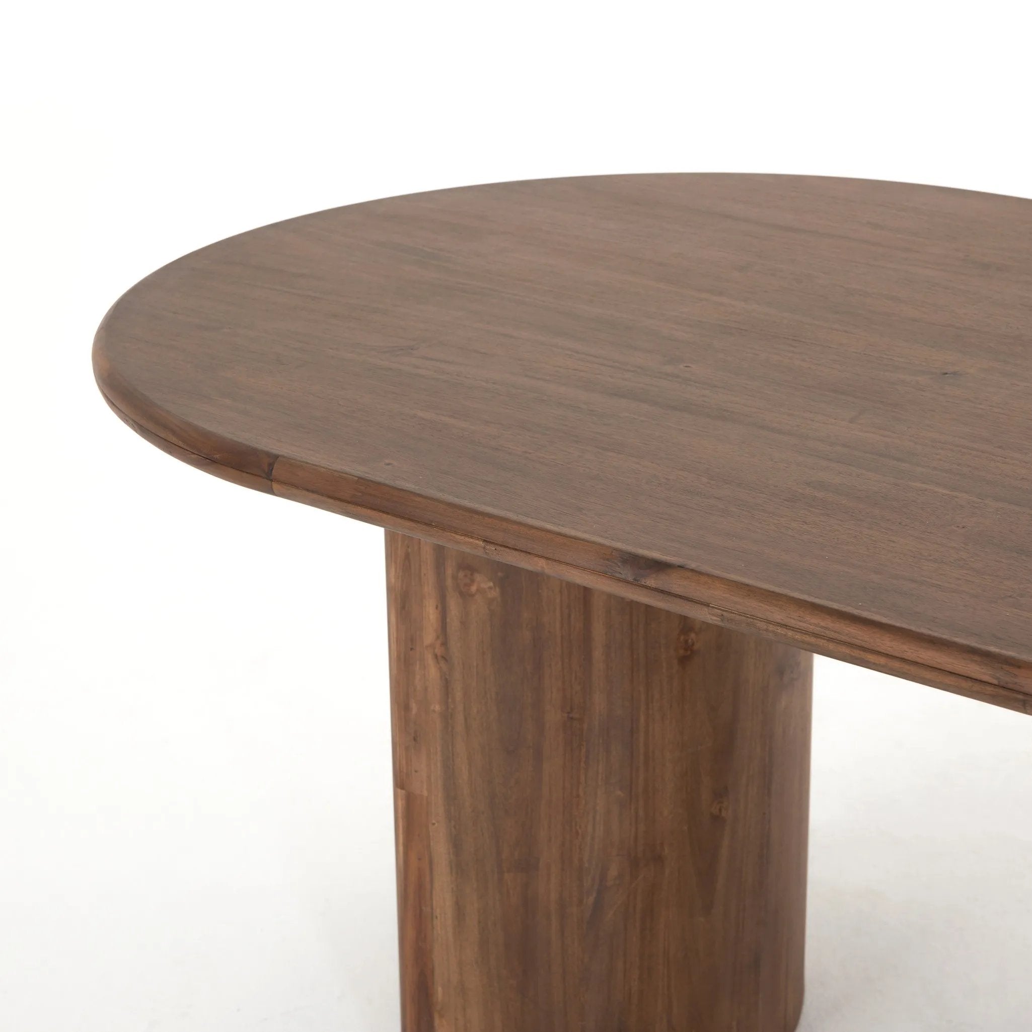 Featuring Paden Seasoned Brown Acacia Dining Table by Four Hands at Amethyst Home. A study in shape. Solid brown acacia forms crescent-shaped legs and sprawling oval tabletop, bringing organic presence to the dining room.Overall Dimensions: 94.00"w x 42.00"d x 30.00"hWeight : 139.33 lbsMaterials : Thin Acacia Veneer, Solid Acacia. Amethyst Home provides interior design, new home construction design consulting, vintage area rugs, and lighting in the Tampa metro area.