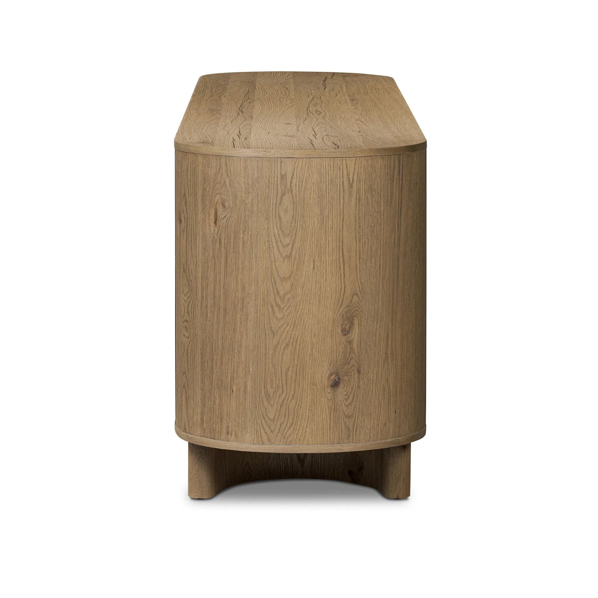 Seasoned worn oak forms curved legs and the cabinets of this sideboard. Generous space for all dining storage needs.As lovers of clean aesthetics at Amethyst, we love the nature inspired Paden Sideboard - Worn Oak Veneer. This item pairs well with other brands such as Surya and is perfect for loft homes Amethyst Home provides interior design, new home construction design consulting, vintage area rugs, and lighting in the Charlotte metro area.