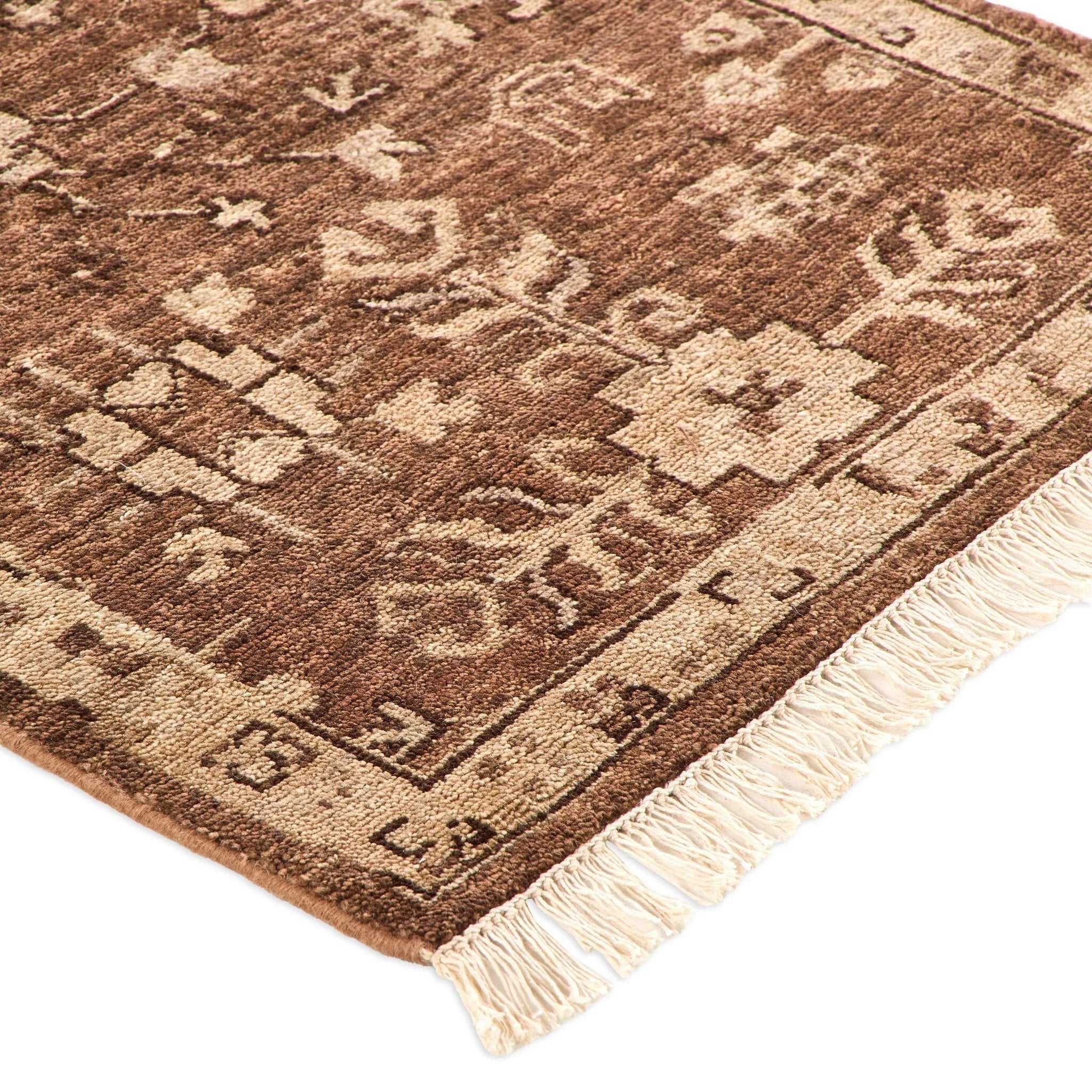 Pure wool is hand-knotted to create the rug's beautiful rustic design and appearance. The durable runner is crafted to wear beautifully over time. Due to the handcrafted nature of this rug, slight variations in sizing may occur Amethyst Home provides interior design, new home construction design consulting, vintage area rugs, and lighting in the Dallas metro area.