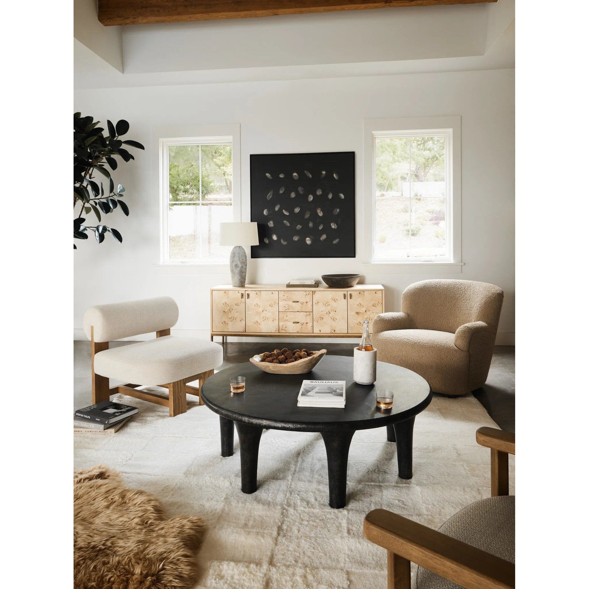 Patchwork Cream Shorn Shearling Rug is shaved to different heights and stitched together to create a tonal checked pattern for a modern yet classic look. Subtle color variations bring a natural, more organic feel to the rug. The material, pattern, and hues come together to craft an unexpected bold style Amethyst Home provides interior design, new home construction design consulting, vintage area rugs, and lighting in the Alpharetta metro area.