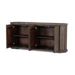 Mixed materials refresh the traditional sideboard, pairing a thick, wide base of dark brown acacia with brown marble rich with natural veining. Cylindrical details and a step base elevates the look. A spacious interior awaits storage of favorite serveware, table linens and more. Amethyst Home provides interior design, new home construction design consulting, vintage area rugs, and lighting in the Tampa metro area.