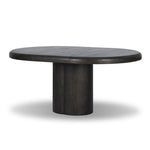 Make space for more guests with a rounded extension table of smoked black mindi, with beautiful visible graining. Inside the tabletop, a hidden mechanism allows for expansion from 48" to 68".As fans of organic modern design at Amethyst, we love the designer inspired Pemble Extension Dining Table - Smoked Black Mindi Veneer. Amethyst Home provides interior design, new home construction design consulting, vintage area rugs, and lighting in the Charlotte metro area.