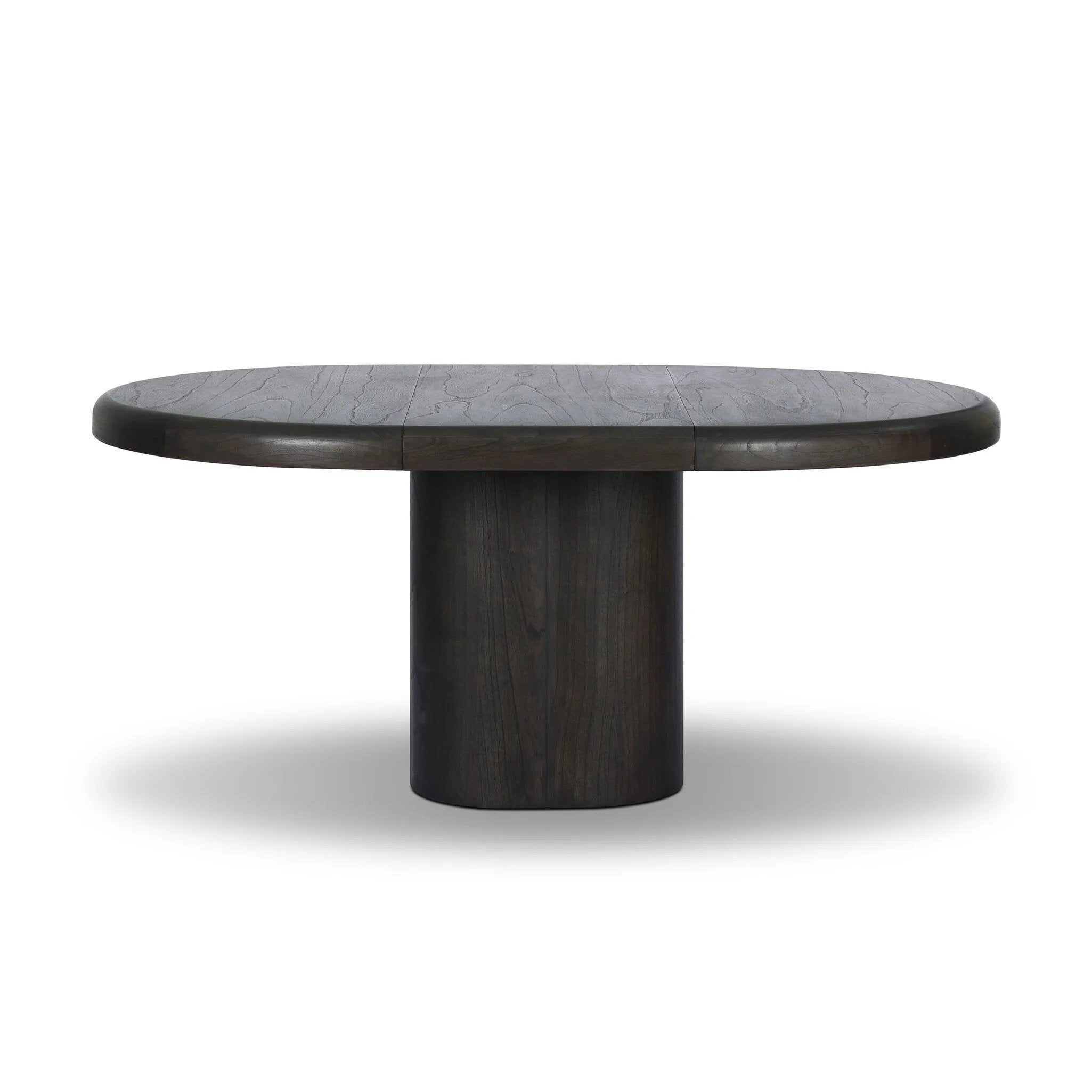 Make space for more guests with a rounded extension table of smoked black mindi, with beautiful visible graining. Inside the tabletop, a hidden mechanism allows for expansion from 48" to 68".As fans of organic modern design at Amethyst, we love the designer inspired Pemble Extension Dining Table - Smoked Black Mindi Veneer. Amethyst Home provides interior design, new home construction design consulting, vintage area rugs, and lighting in the Omaha metro area.