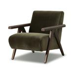 Contemporary outfitting of a vintage chair design offers easy comfort. Upholstered in velvety olive green, the wooden frame is finished in a vintage ash hue. Ideally placed as an accent chair or in pairs Amethyst Home provides interior design, new home construction design consulting, vintage area rugs, and lighting in the Park City metro area.